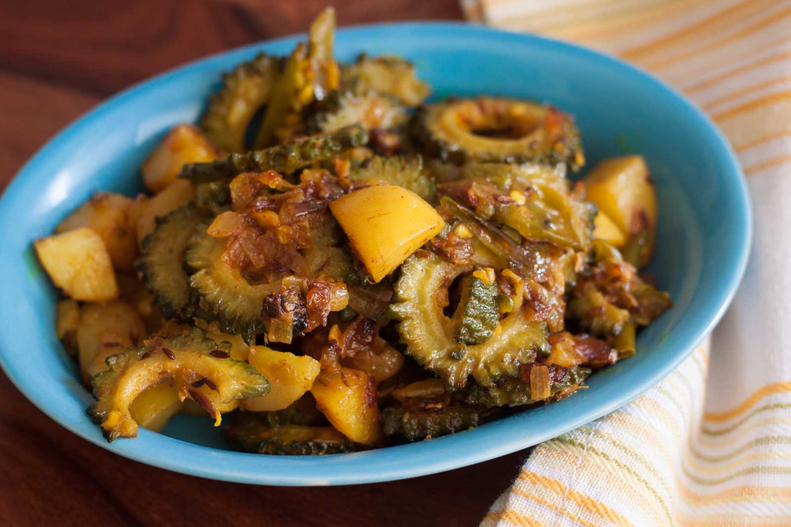 Manipuri Style Karotkhabi Kanghou Recipe - Bitter Gourd & Potato Stir Fry