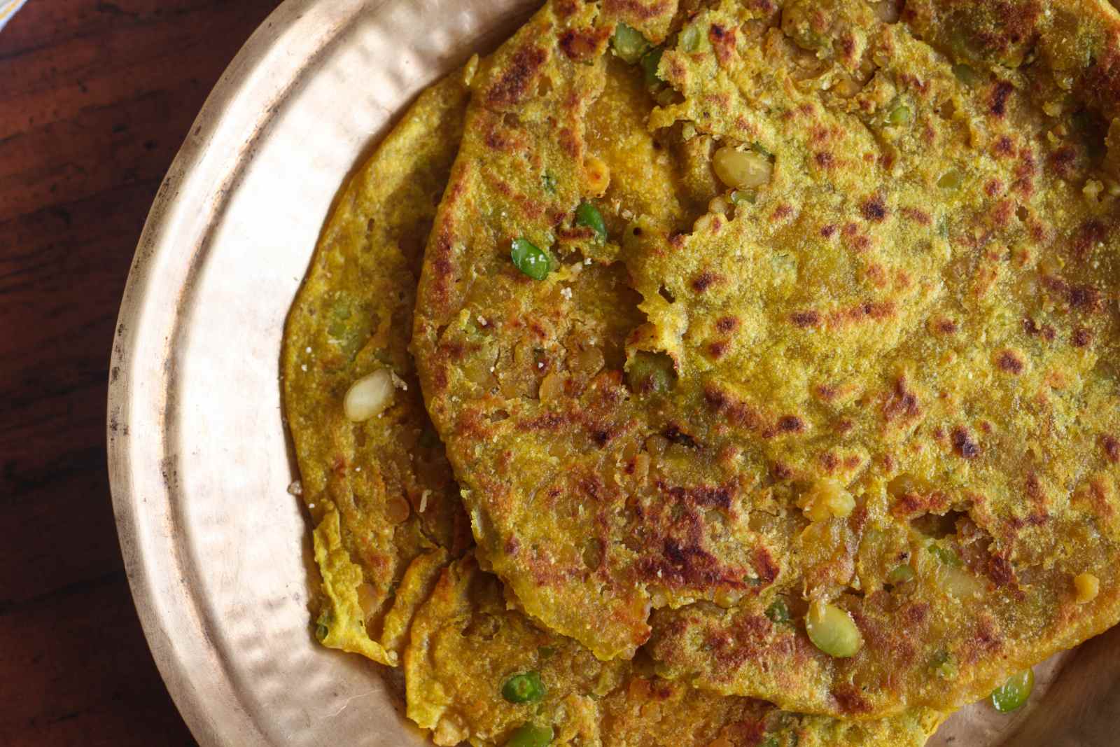 Avarekaalu Obbatu Recipe ( Sweet Paratha stuffed with Field Beans Recipe)